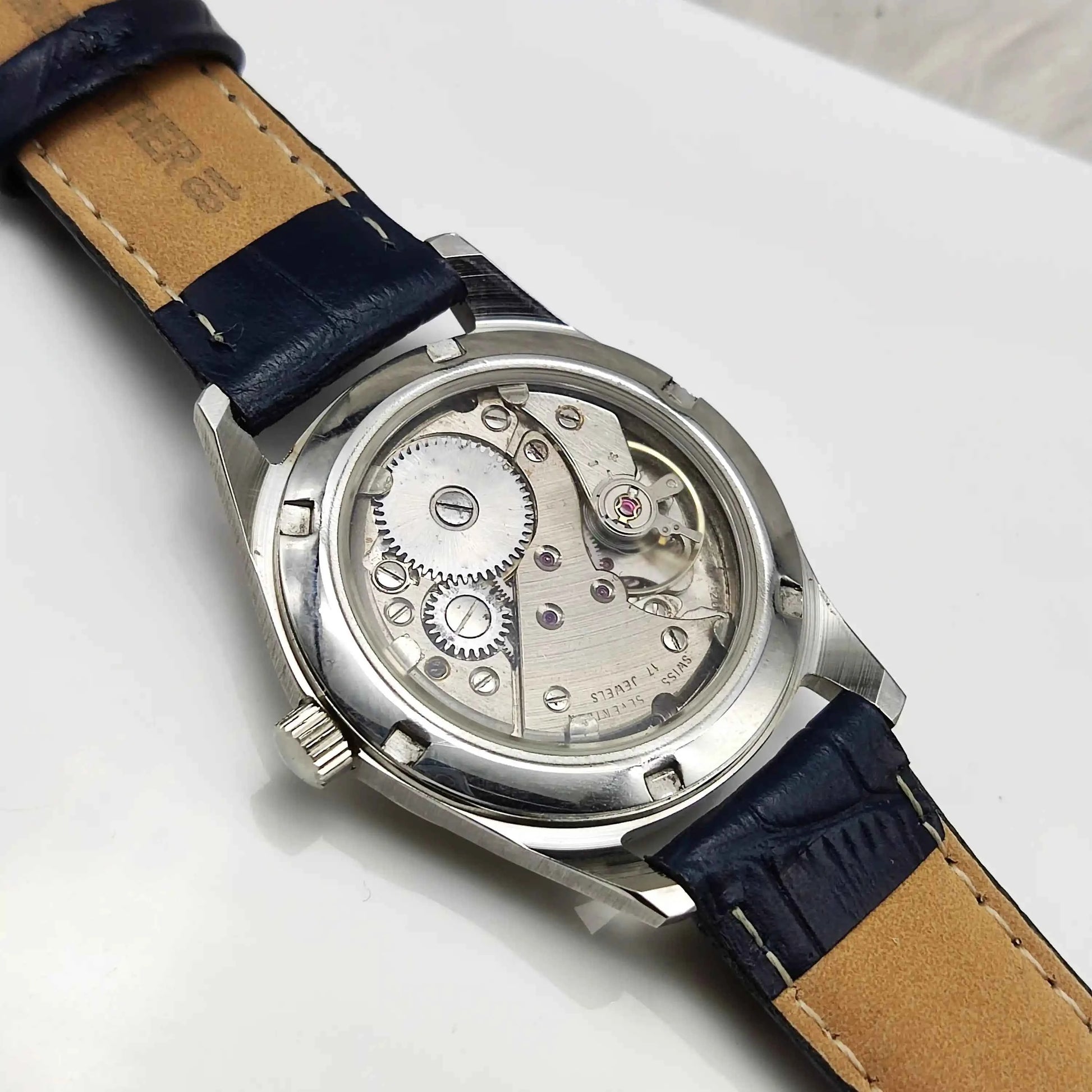 Camy Geneve 17 Jewels Shock Proof Bluish Dial English Numerals Watch Transparent Back Sub Dial