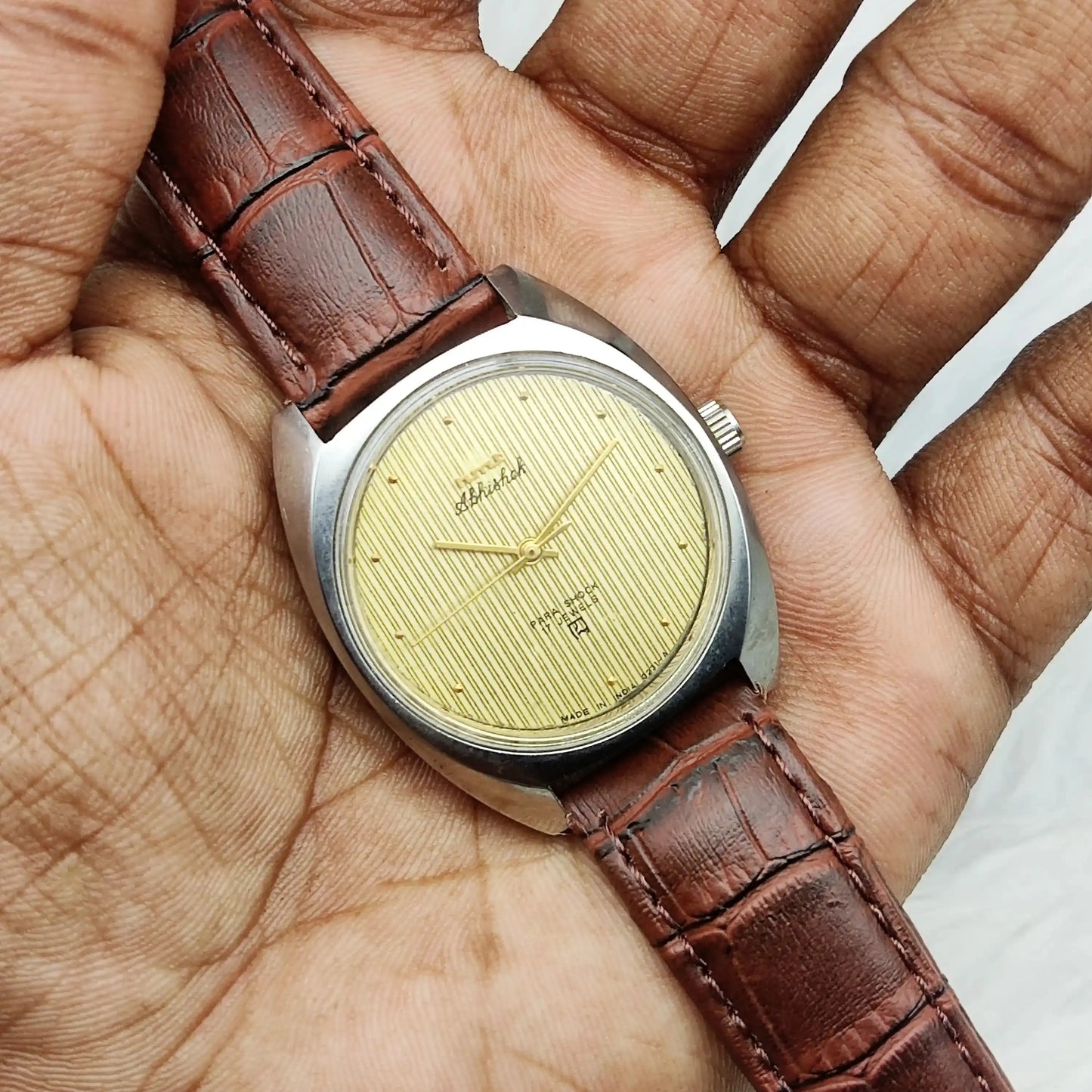 HMT Abhishek Para Shock 17 Jewels Golden Dial Dotted Indices Handwinding Watch