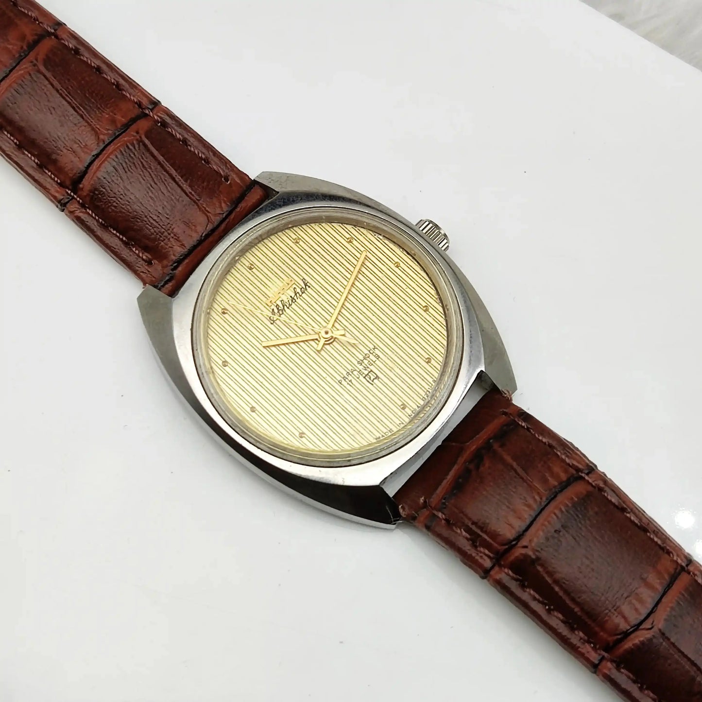 HMT Abhishek Para Shock 17 Jewels Golden Dial Dotted Indices Handwinding Watch