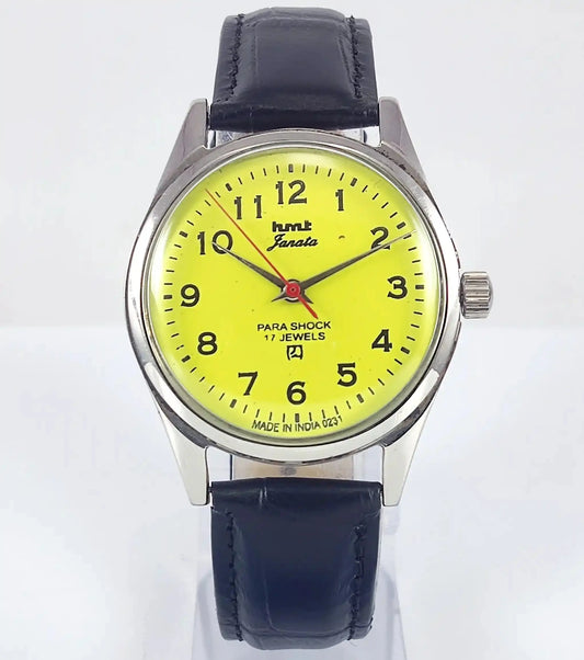 HMT Janata English Numerals Peacock Yellow Dial Para Shock 17 Jewels - Discover-Diamonds