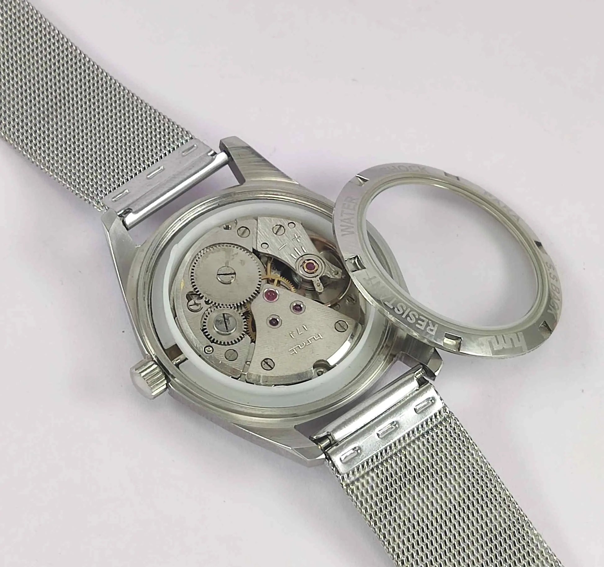 HMT Janata Para Shock 17 Jewels Radium Hands Black Devanagari Dial Transparent Back