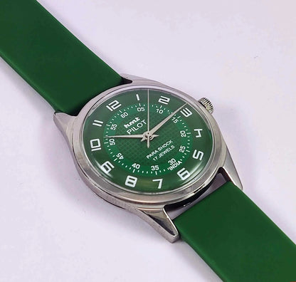 Green watch with a green strap on a white background