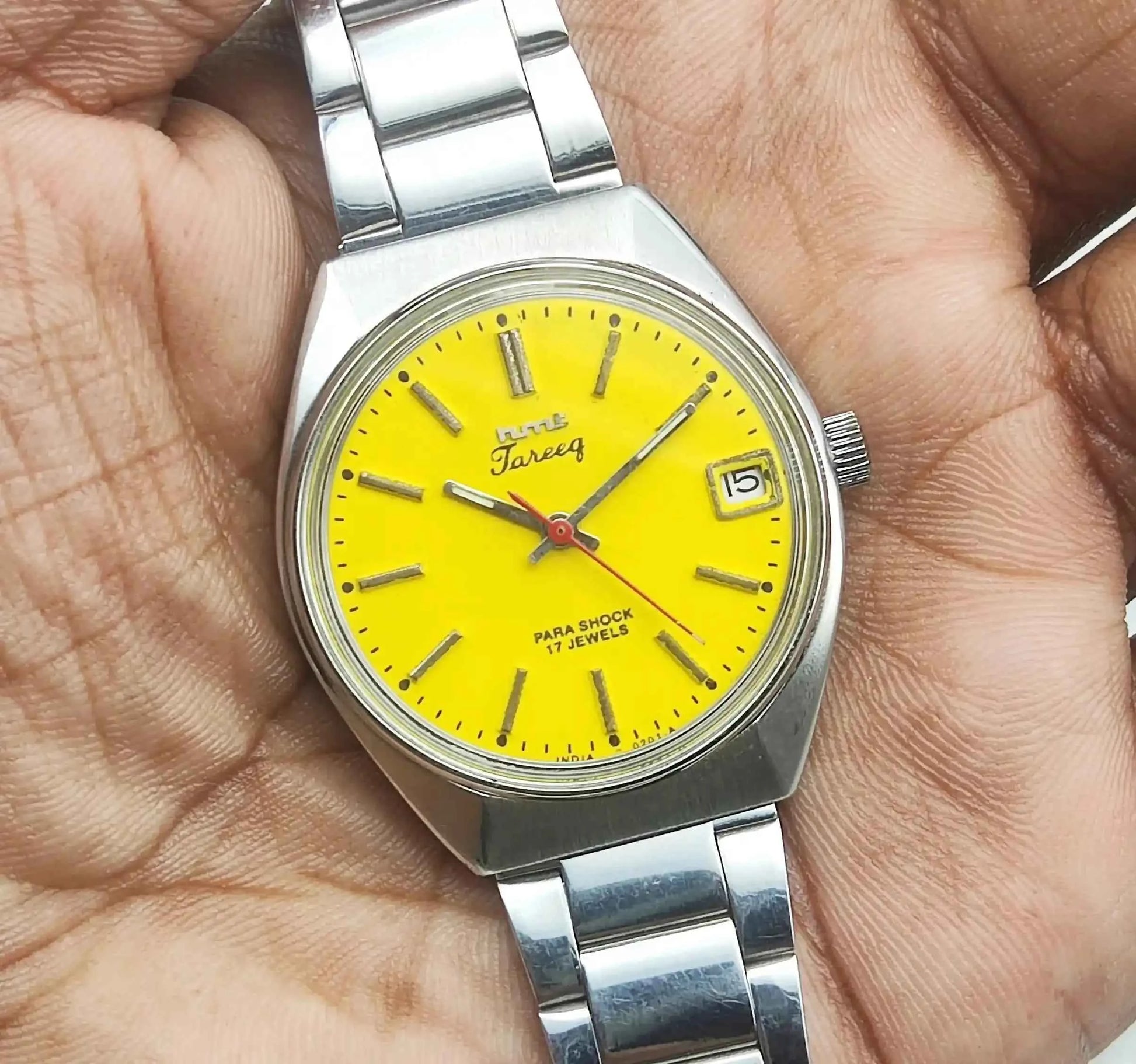 HMT Tareeq Para Shock 17 Jewels Yellow Dial Stick Indices Date Function