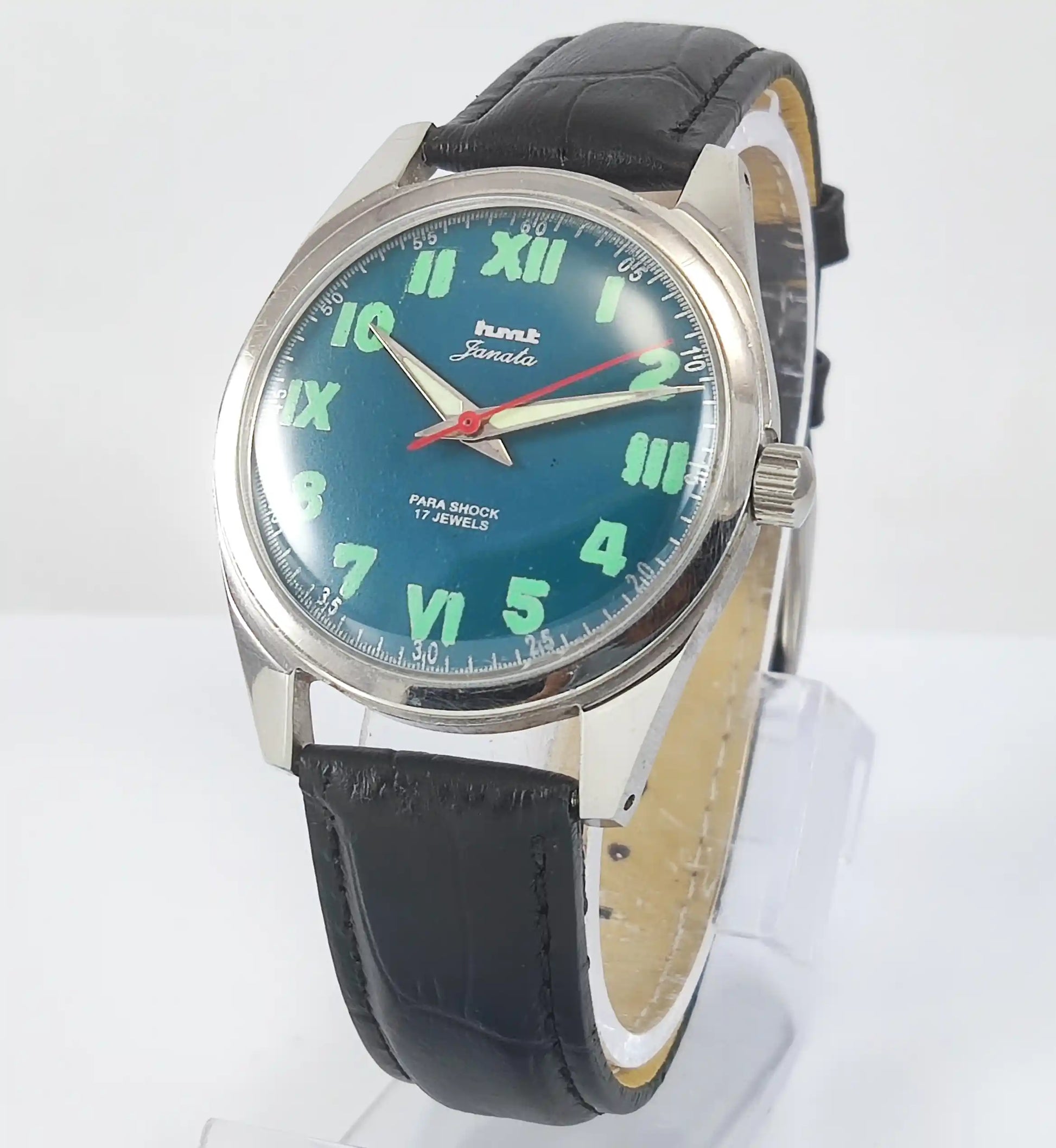 HMT Janata English Numerals Peacock Blue Dial Para Shock 17 Jewels - Discover-Diamonds