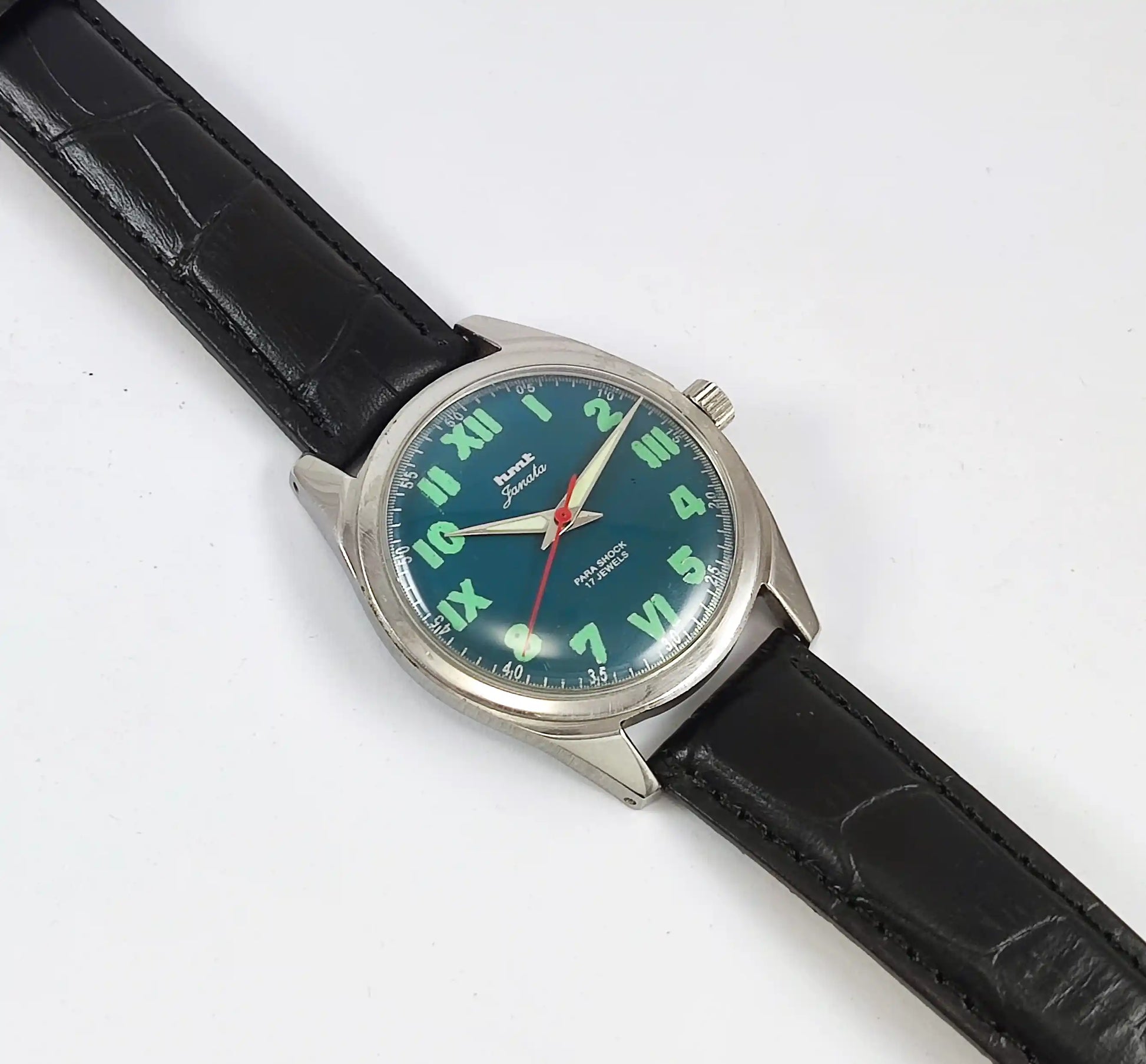 HMT Janata English Numerals Peacock Blue Dial Para Shock 17 Jewels - Discover-Diamonds