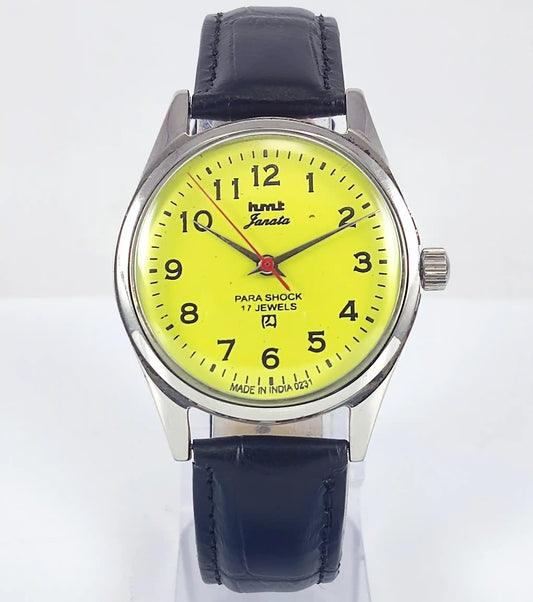 HMT Janata English Numerals Peacock Yellow Dial Para Shock 17 Jewels - Discover-Diamonds