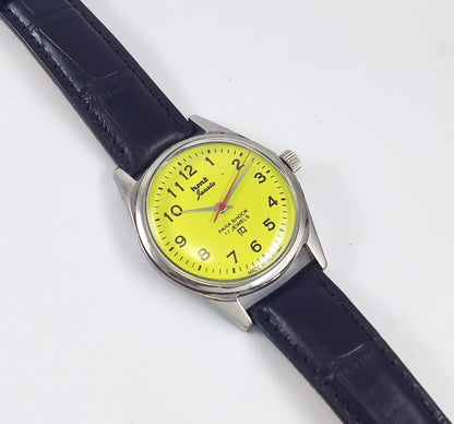 HMT Janata English Numerals Peacock Yellow Dial Para Shock 17 Jewels - Discover-Diamonds