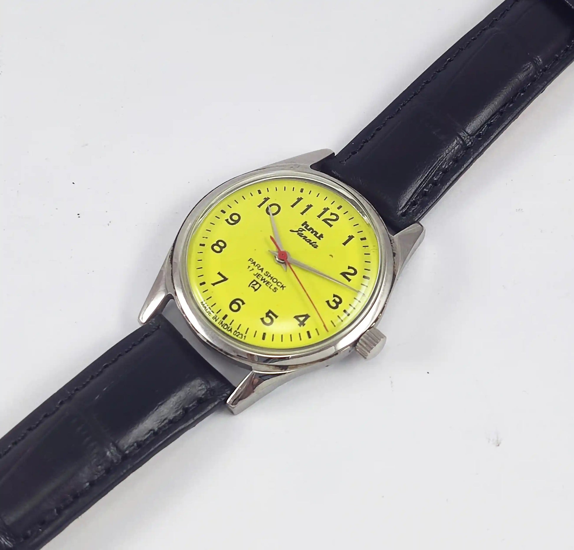 HMT Janata English Numerals Peacock Yellow Dial Para Shock 17 Jewels - Discover-Diamonds