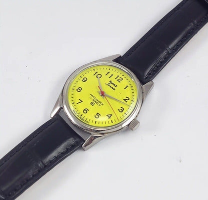 HMT Janata English Numerals Peacock Yellow Dial Para Shock 17 Jewels - Discover-Diamonds