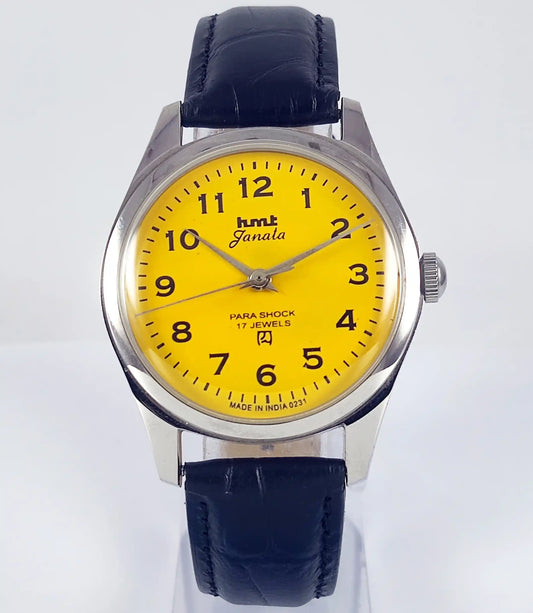 HMT Janata English Numerals Yellow Dial Para Shock 17 Jewels Transparent Back - Discover-Diamonds