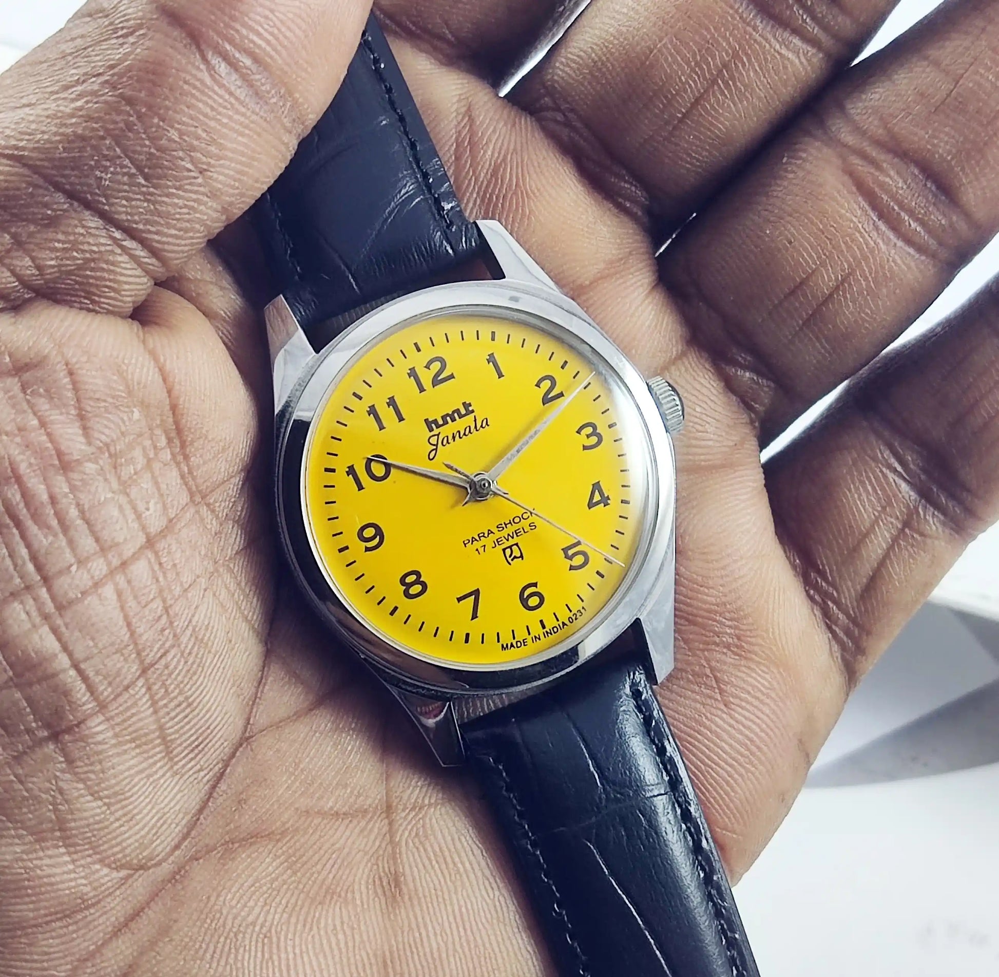 HMT Janata English Numerals Yellow Dial Para Shock 17 Jewels Transparent Back - Discover-Diamonds