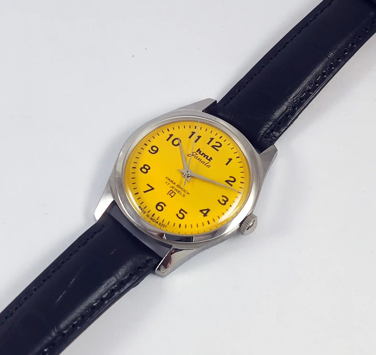 HMT Janata English Numerals Yellow Dial Para Shock 17 Jewels Transparent Back - Discover-Diamonds