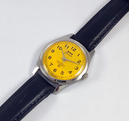 HMT Janata English Numerals Yellow Dial Para Shock 17 Jewels Transparent Back - Discover-Diamonds