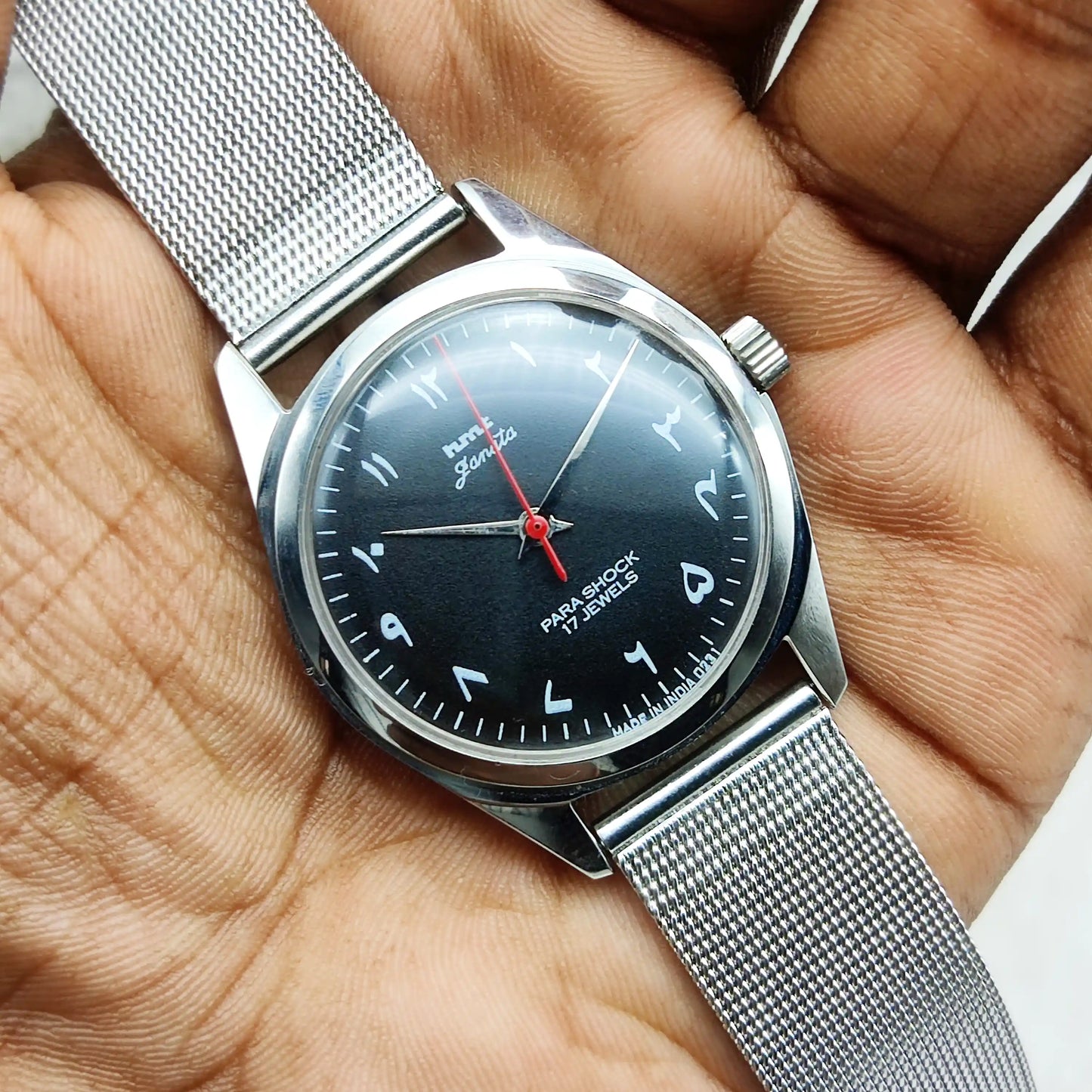 HMT Janata Handwinding Men's Watch with Black Dial Arabic Font and Transparent Back, 17 Jewels
