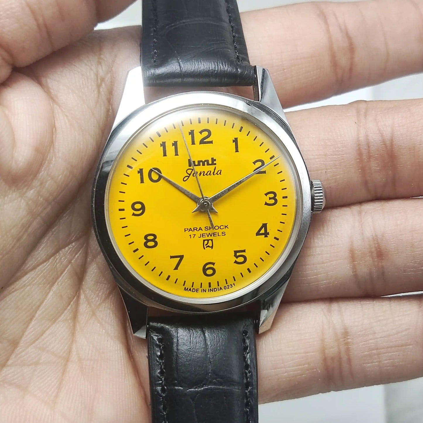 HMT Janata Sun Yellow English Numerals Handwinding Watch Transparent Back