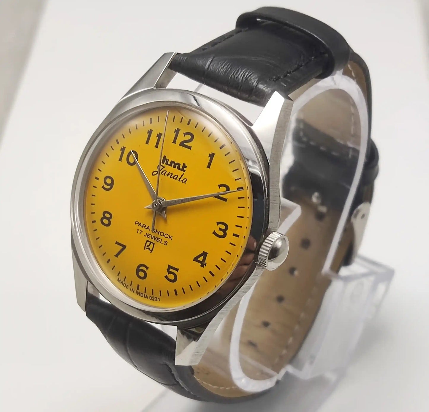 HMT Janata Sun Yellow English Numerals Handwinding Watch Transparent Back