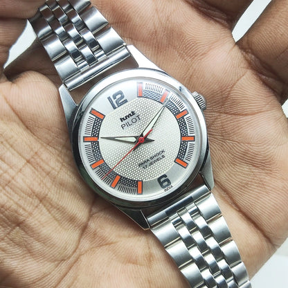 HMT Pilot Handwinding Watch - 17 Jewels Biscuit Color Dial with English-Stick Numerals and Transparent Back