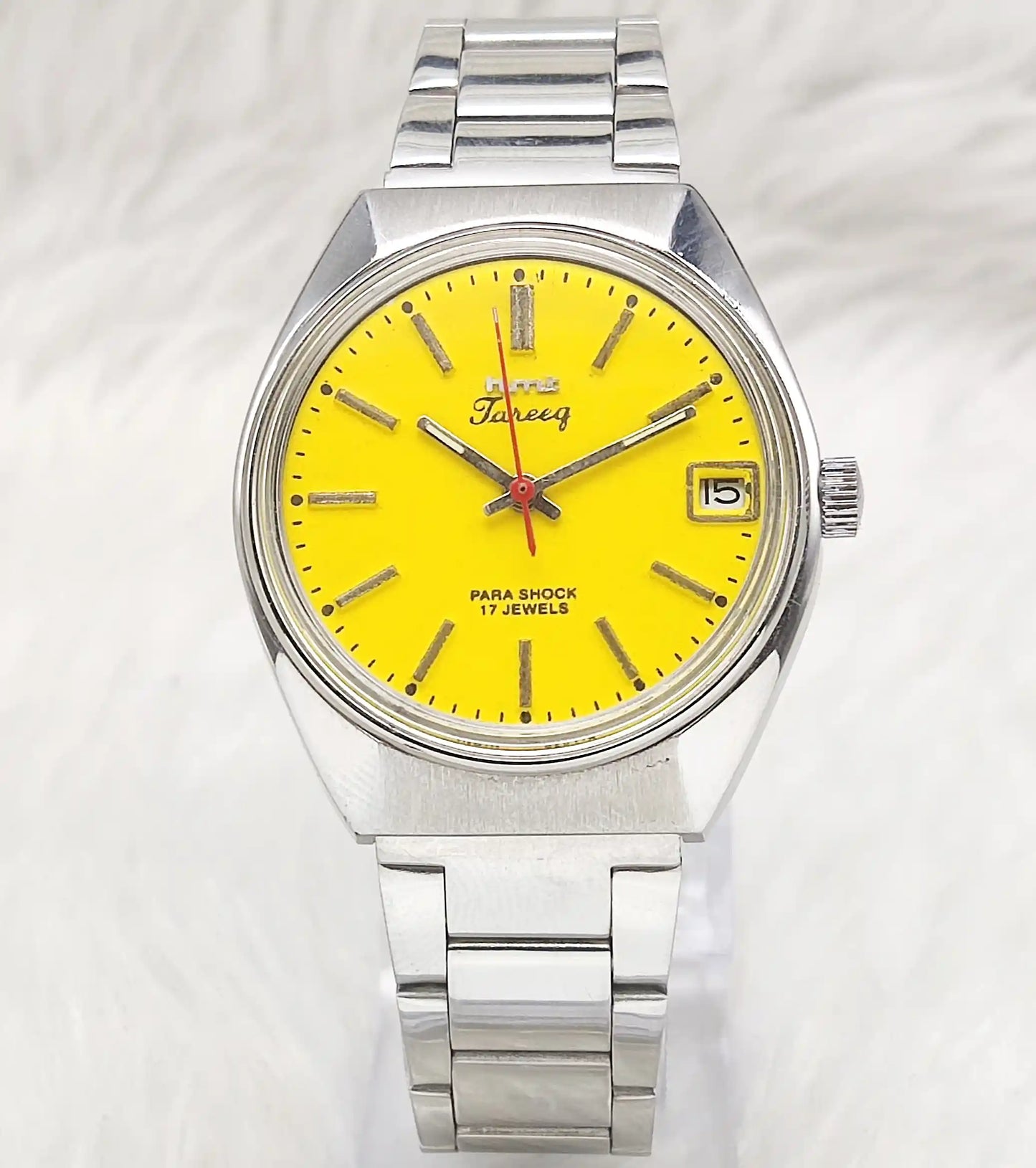 HMT Tareeq Men's Watch with Yellow Dial, 17 Jewels, Stick Indices, and Date Features