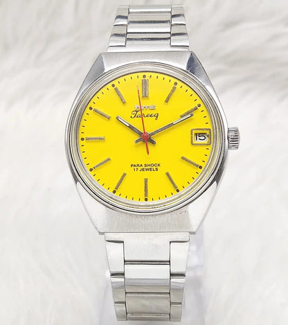 HMT Tareeq Men's Watch with Yellow Dial, 17 Jewels, Stick Indices, and Date Features