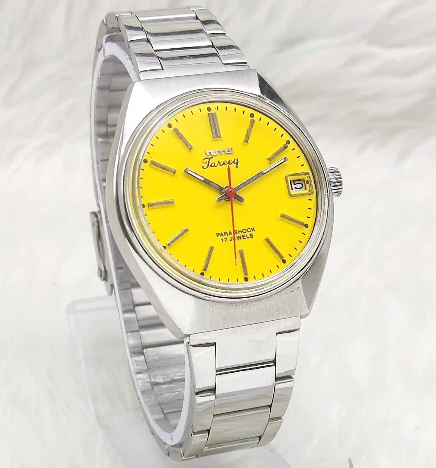 HMT Tareeq Men's Watch with Yellow Dial, 17 Jewels, Stick Indices, and Date Features