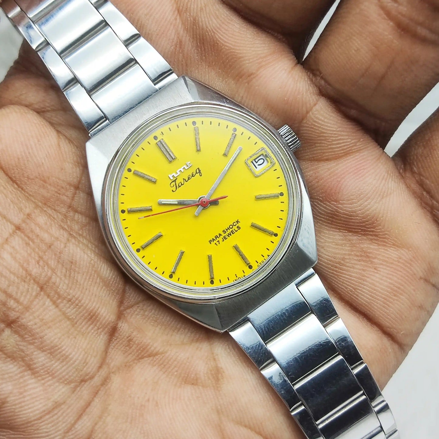 HMT Tareeq Men's Watch with Yellow Dial, 17 Jewels, Stick Indices, and Date Features