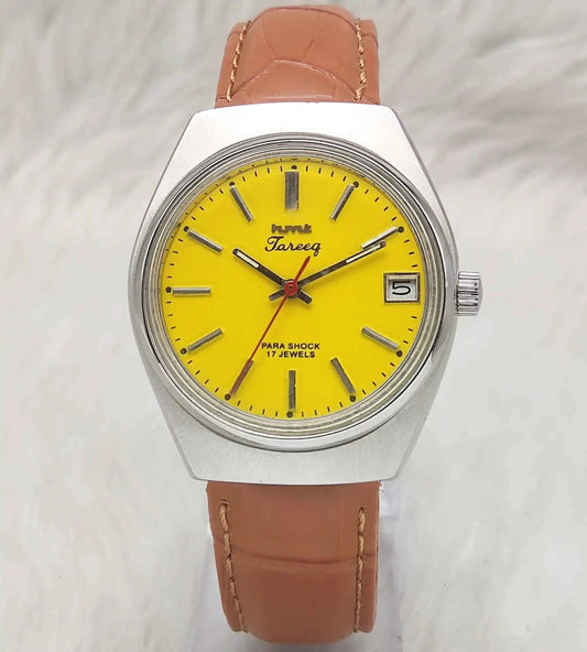 HMT Tareeq Para Shock 17 Jewels Mechanical Handwinding Watch with Yellow Dial and Day Function
