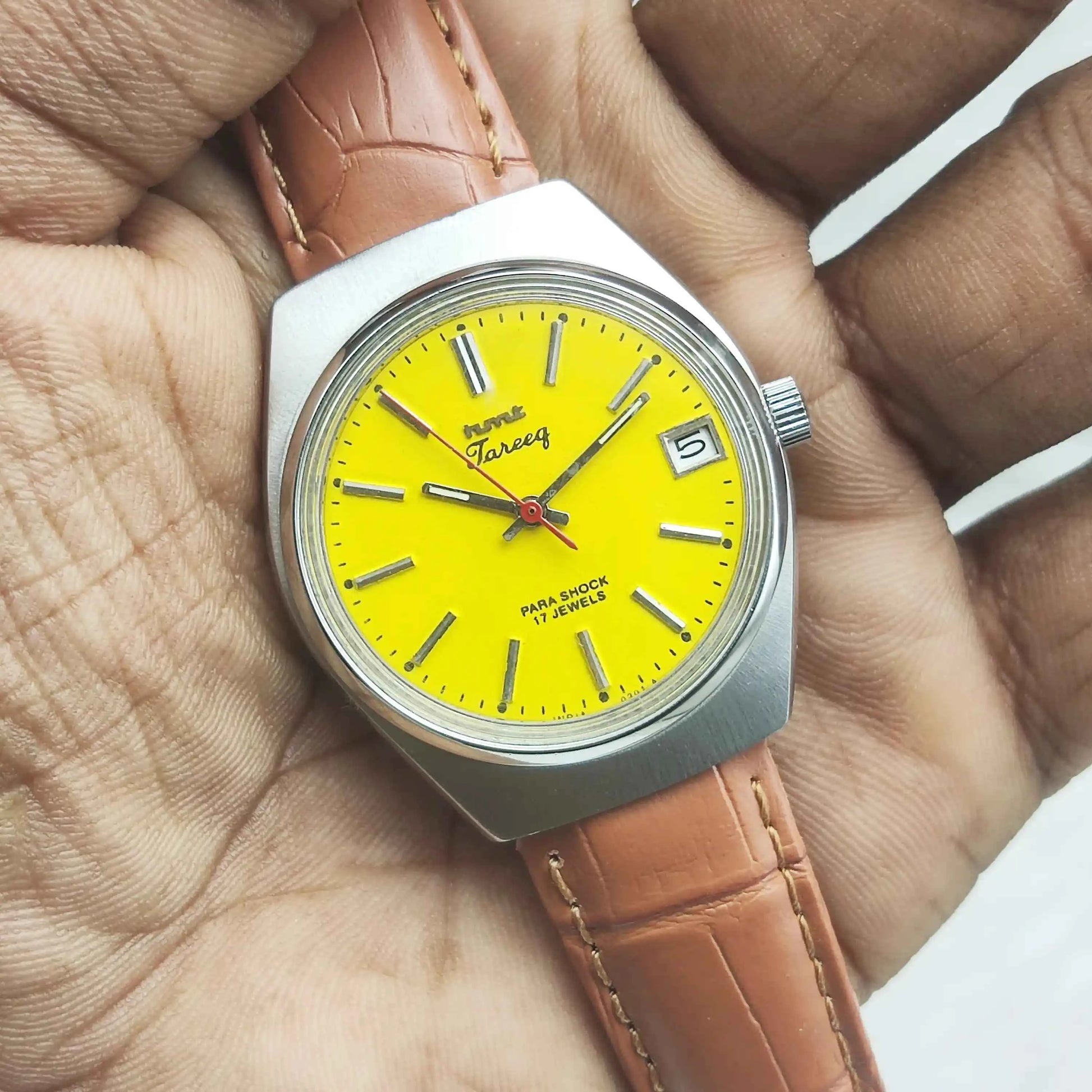 HMT Tareeq Para Shock 17 Jewels Mechanical Handwinding Watch with Yellow Dial and Day Function