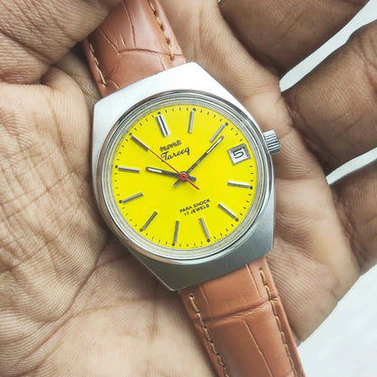 HMT Tareeq Para Shock 17 Jewels Mechanical Handwinding Watch with Yellow Dial and Day Function