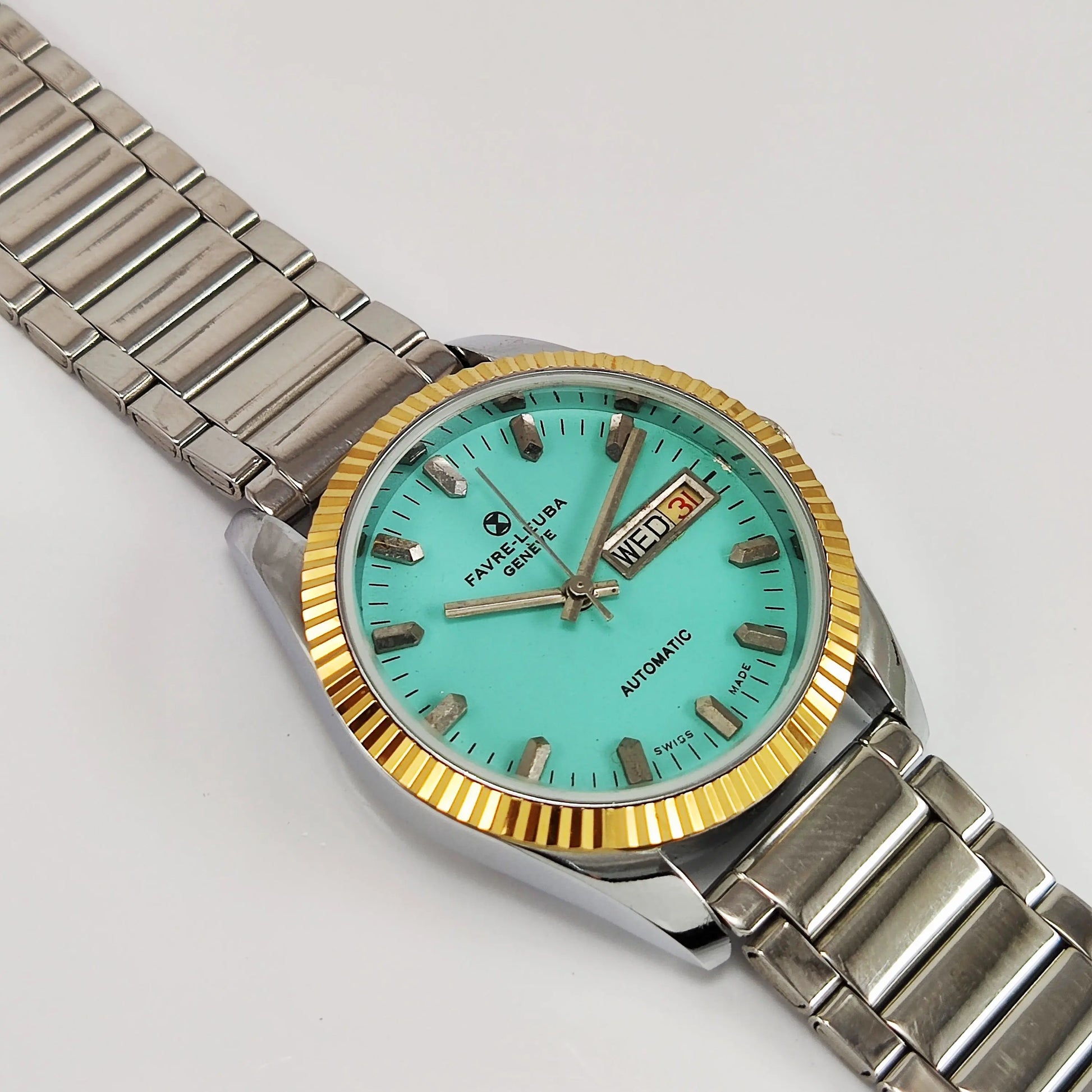 Favre-Leuba Geneve Automatic-2066 Swiss Made Turquoise Color Dial Golden Color Day-Date Function Men's Automatic Wrist Watch Discover Diamonds