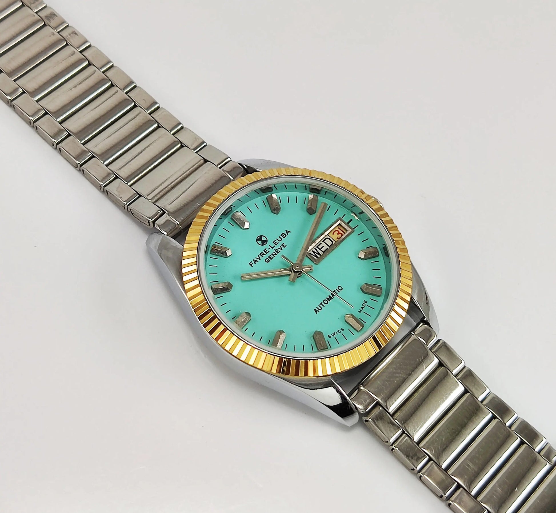 Favre-Leuba Geneve Automatic-2066 Swiss Made Turquoise Color Dial Golden Color Day-Date Function Men's Automatic Wrist Watch Discover Diamonds