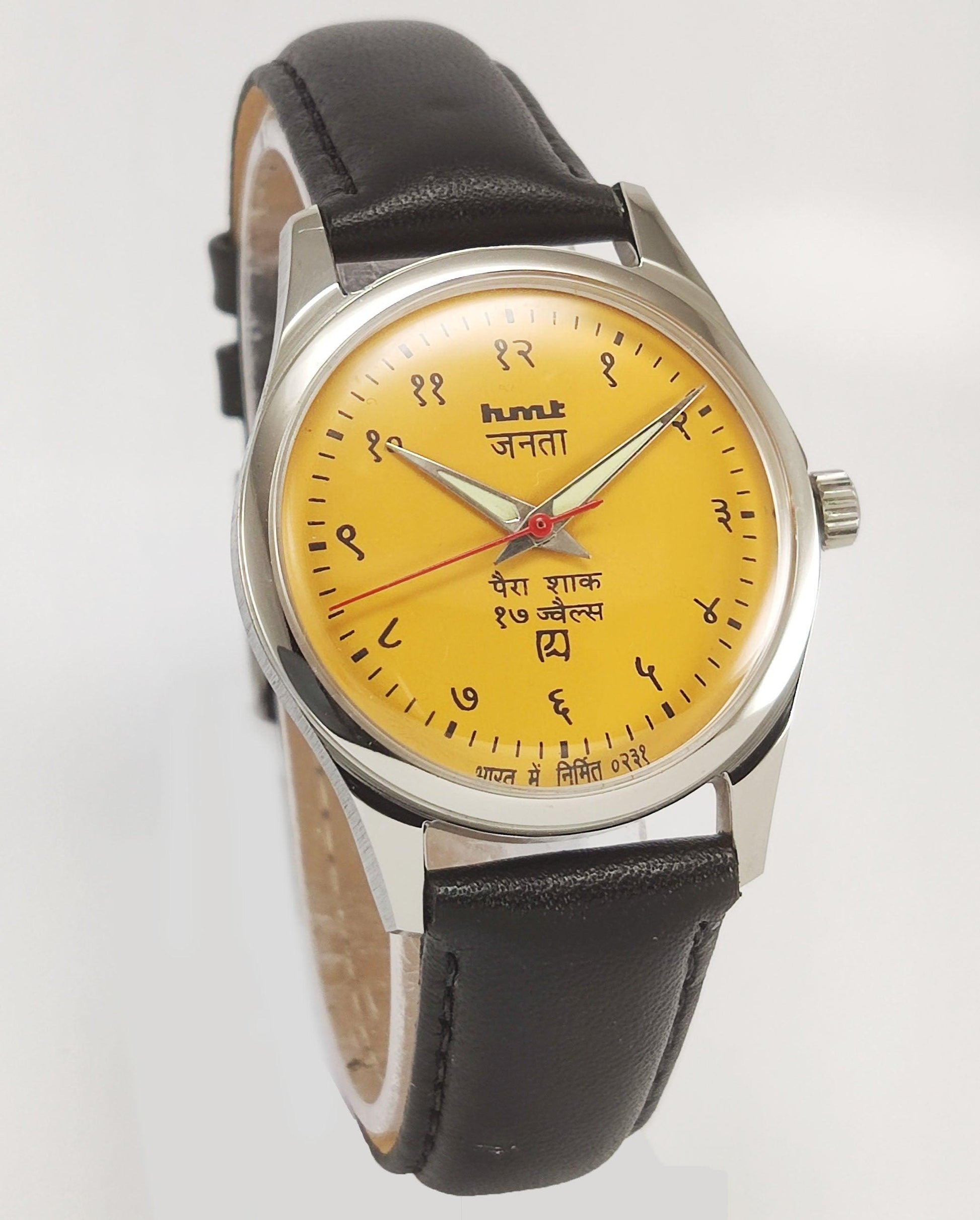 HMT Janata Para Shock 17 Jewels Radium Hands Sun Yellow Devanagari Dial Transparent Back Mechanical Hand winding Men's Wrist Watch - Discover-Diamonds