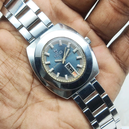 Nino Automatic 2066 Gray Dial Watch with 17 Jewels and Day-Date Features