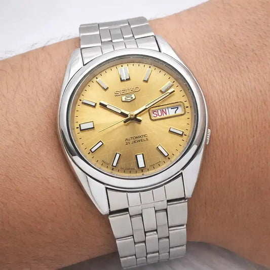 Seiko 5 Automatic 21 Jewels 7S26B Golden Dial Day Date Transparent Back Discover-Diamonds Physical