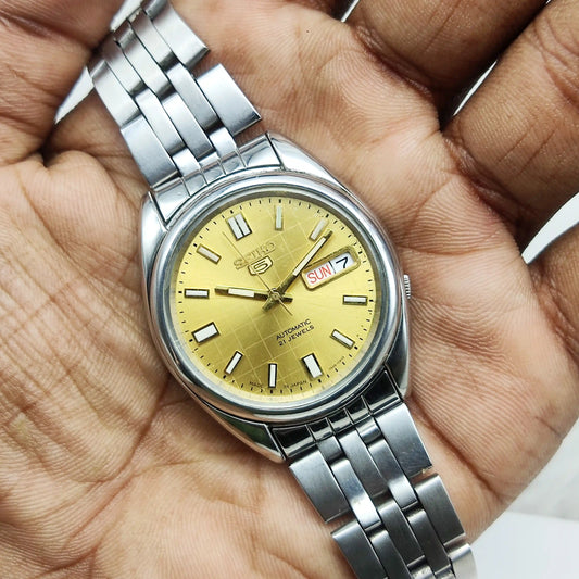 Seiko 5 Automatic 21 Jewels Men's Watch with Golden Dial and Transparent Back 7S26B